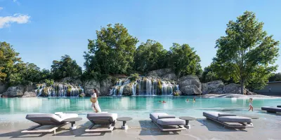 Swimmable Forest Lagoon with Waterfall