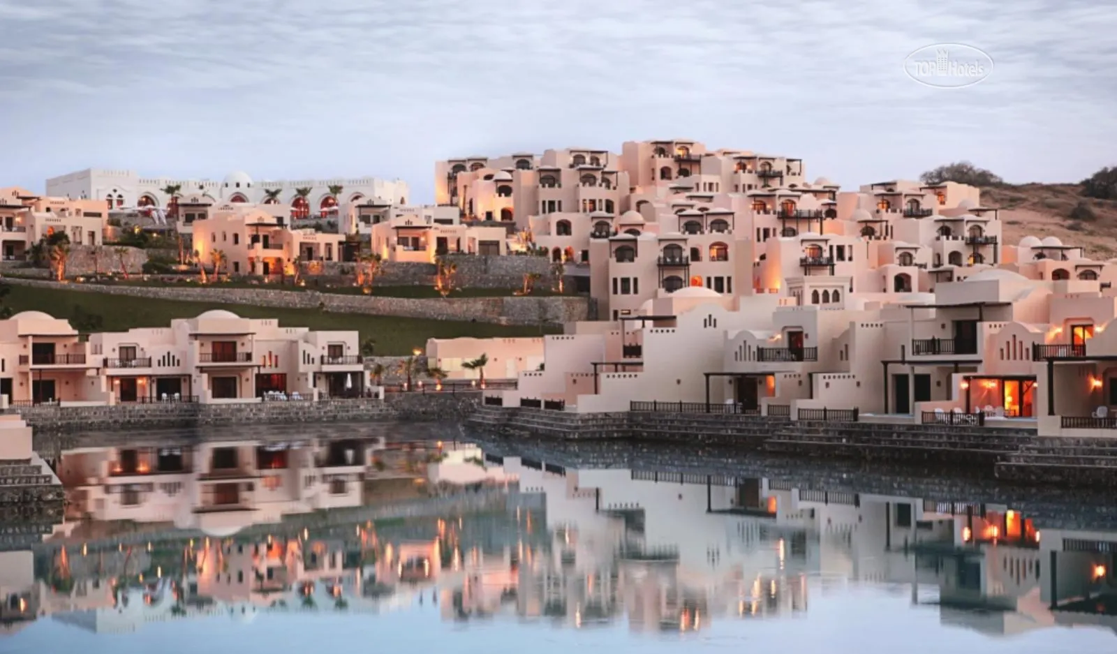 The Cove Rotana Resort by Orascom Development in Al Arqoub