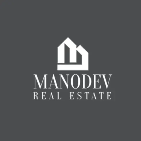 Manodev Real Estate Development logo